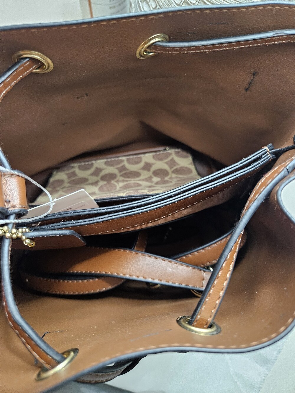 Brown Signature Canvas Drawstring Bucket Bag with Matching Pouch - Picture 5 of 9